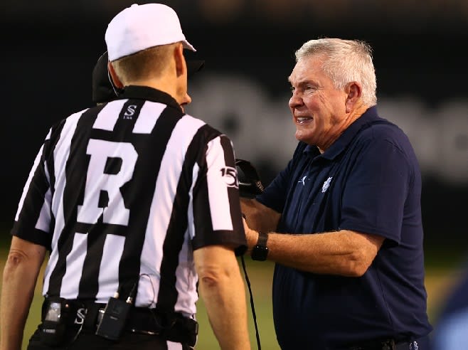 UNC Coach Mack Brown is highly competitive, but also keeps a balance within the walls of his program.