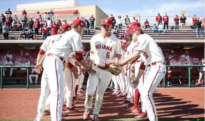 OF Grant Richardson and teammates take the field at Bart Kaufman Field in Bloomington, IN. (IU Athletics) (@indianabase)