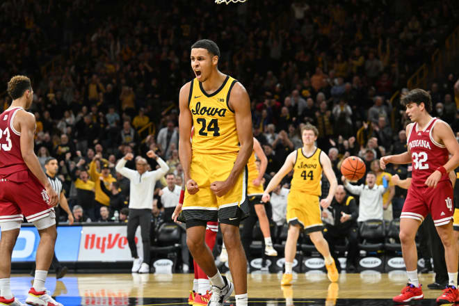 Kris Murray celebrates a key basket in Iowa's comeback win over #15 Indiana.