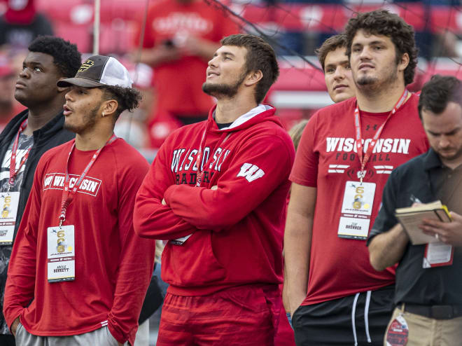 Four-star standout lineman Carson Hinzman (center) taking in Wisconsin's season-opener against Penn State in September