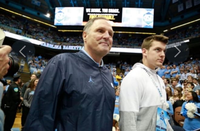 Kendall Karr, above with Tim Brewster on Saturday, said the vibe at UNC is much different with the new staff.