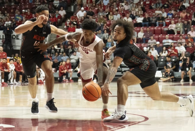 Alabama guard Aaron Estrada splits between Mercer forward TJ Grant (14) and Mercer guard Jah Quinones (0) at Coleman Coliseum. | Photo: Gary Cosby Jr.-USA TODAY Sports