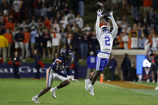 Duke's Sahmir Hagans can't pull in a catch against Virginia's Tayvonn Kyle during Saturday's game. 