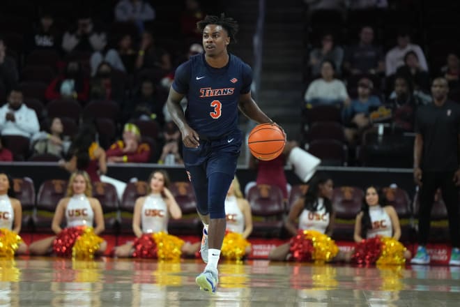 Cal State Fullerton Titans guard Latrell Wrightsell Jr. (3) dribbles the ball against the Southern California Trojans in the first half at Galen Center. Photo | Kirby Lee-USA TODAY Sports