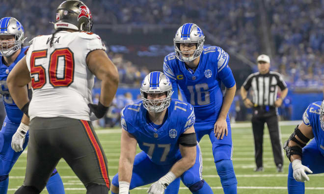 Former Arkansas center Frank Ragnow gets set to snap the ball to Detroit Lions quarterback Jared Goff during Sunday's game against the Tampa Bay Buccaneers in the Division Round of the NFL Playoffs. 