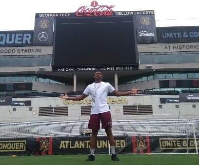 Thomas poses during his penultimate visit to Tech in July