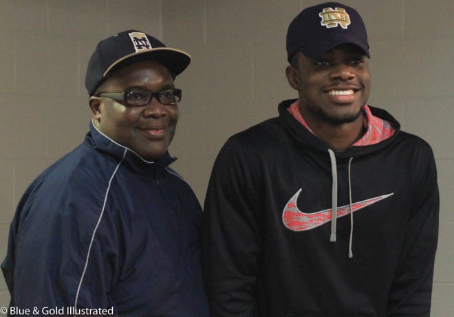 New Irish commit Micah Jones and his father Mark Jones pose for pictures following Micah's announcement to join Notre Dame's 2018 class.