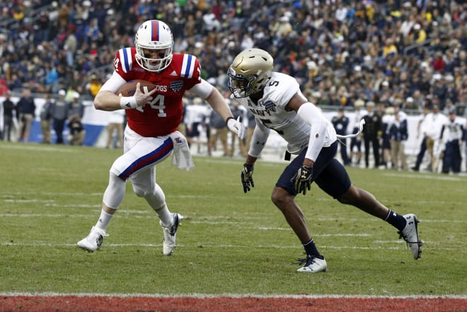 Ryan Higgins scores a rushing touchdown in the first quarter of the Armed Forces Bowl.