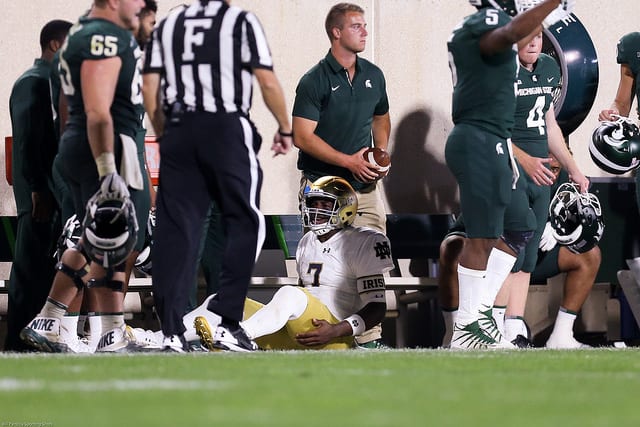 Brandon Wimbush was fortunate to not get seriously hurt on a late hit by Michigan State linebacker Chris Frey.
