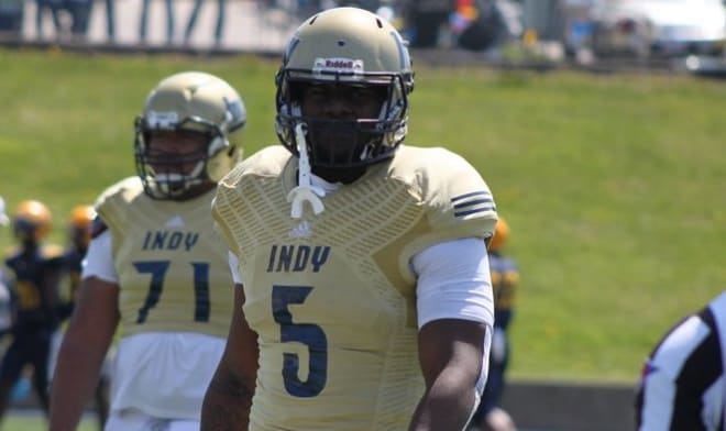 JUCO defensive tackle Jeffrey M'ba holds a Michigan Wolverines football recruiting offer. 