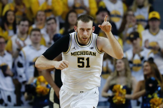 Michigan Wolverines basketball fifth-year senior forward Austin Davis averaged 4.9 points per game last season.