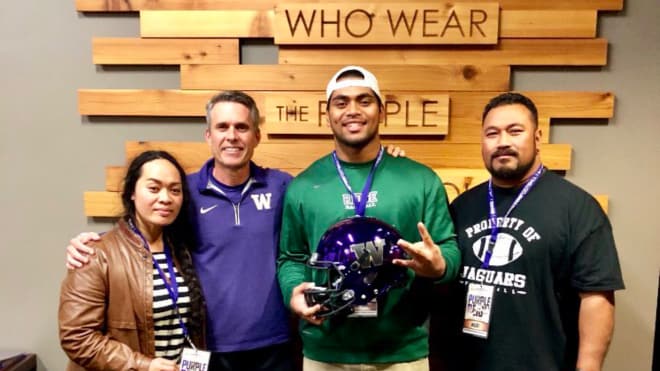 UW head coach Chris Petersen with Mosiah Nasili-Liu. 