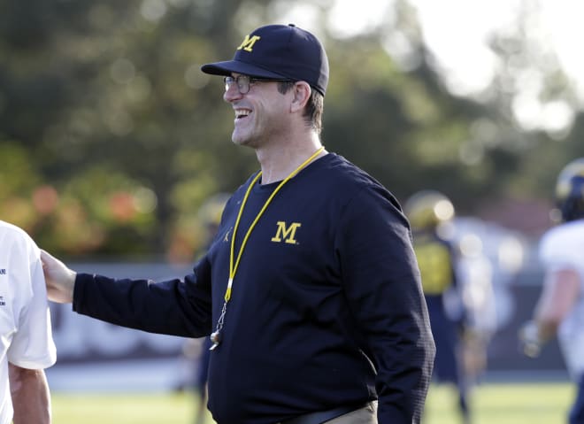 Michigan Wolverines head football coach Jim Harbaugh has won 49 games at U-M.