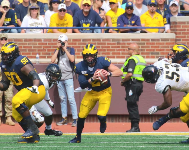 Michigan Wolverines football senior quarterback Shea Patterson completed 19 of his 29 passes for 207 yards on Saturday.