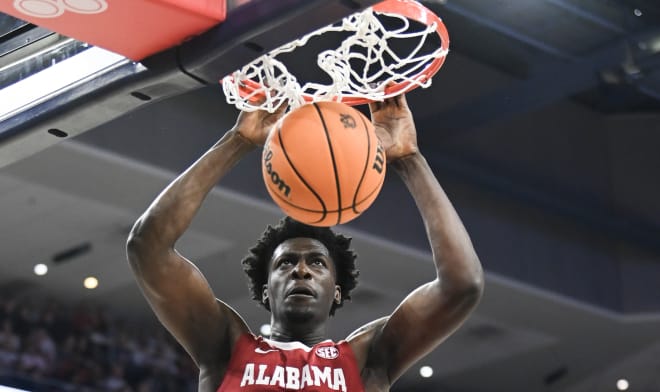 Alabama Crimson Tide center Charles Bediako (14) dunks against the Auburn Tigers at Neville Arena. Photo | Julie Bennett-USA TODAY Sports