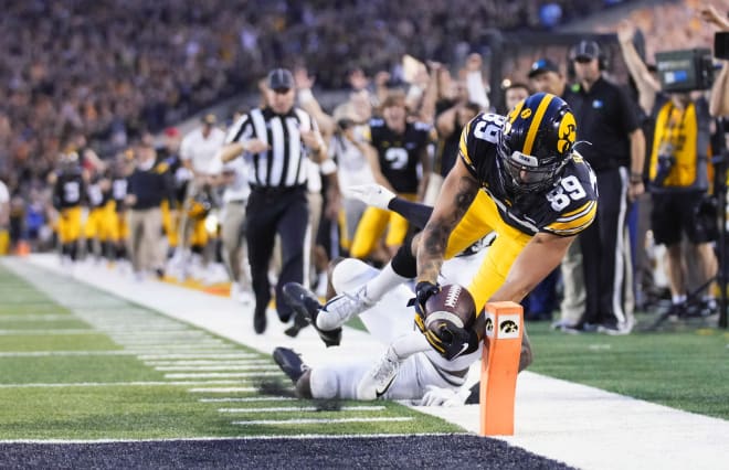 Nico Ragaini had to the go-ahead touchdown for the Hawkeyes on their way to a 23-20 win.
