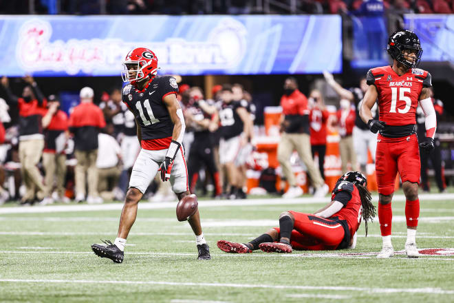 Arian Smith celebrates after catching a pass against Cincinnati. (Tony Walsh/UGA Sports Communications)
