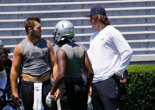 Jake Fromm (left) figures to get a fair shot when it comes to winning the starting job at QB.