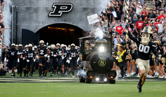 The Purdue Boilermakers make their way to the field during the NCAA football game against the Wisconsin Badgers, Friday, Sept. 22, 2023, at Ross-Ade Stadium in West Lafayette, Ind. Wisconsin Badgers won 38-17.