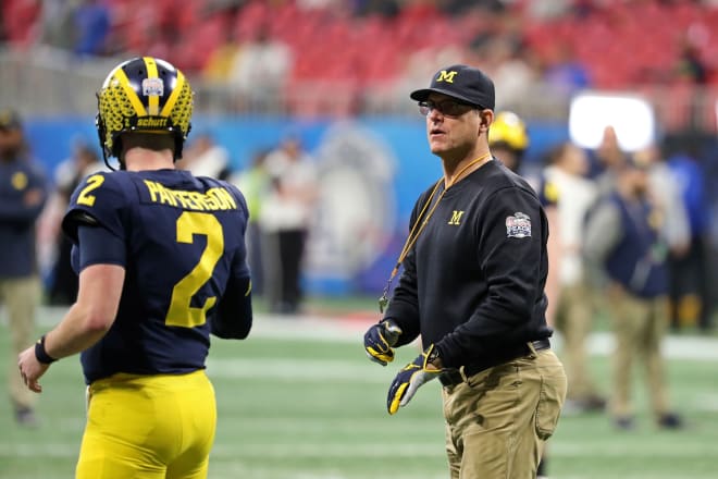 Senior quarterback Shea Patterson and head coach Jim Harbaugh are key players in an more potent offense for the Michigan Wolverines. 