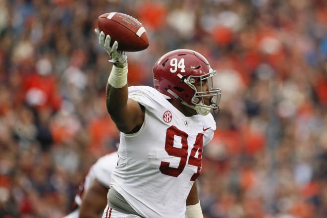 Alabama Crimson Tide defensive lineman Da'Ron Payne (94) recovers a fumble during the first quarter Auburn Tigers at Jordan-Hare Stadium. Photo | John Reed-USA TODAY Sports