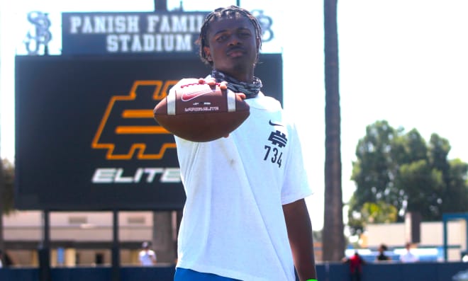 California quarterback Nate Johnson holds a Michigan Wolverines football recruiting offer from Jim Harbaugh.