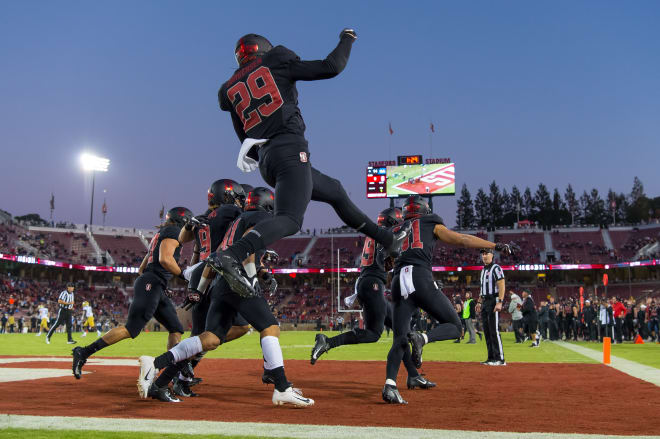 Spencer Jorgensen (No. 29) blocked a punt in the UCLA game last season and became a key special teams player. Jorgensen and linebacker Thunder Keck were placed on scholarship Saturday.