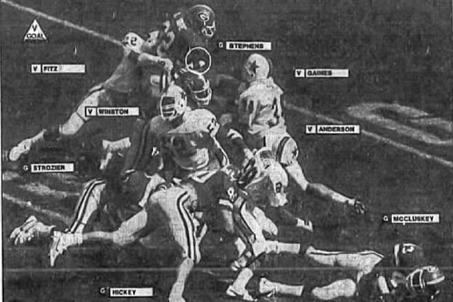 From the Atlanta Journal-Constitution, Jim Hickey (bottom) helps pave the way for a touchdown scored by Lars Tate against Vanderbilt in 1986.