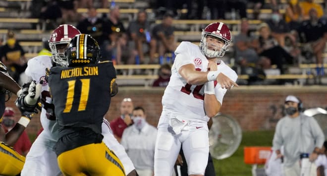 Alabama Crimson Tide quarterback Mac Jones (10) throws a pass for a touchdown against the Missouri Tigers during the first half at Faurot Field at Memorial Stadium. Photo | Imagn 