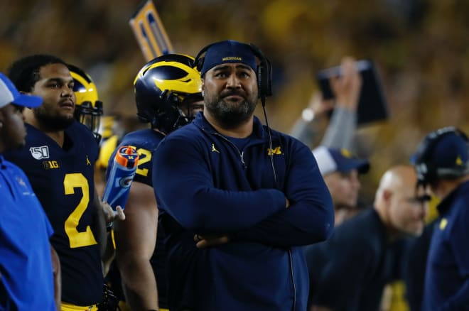 Michigan defensive line coach Shaun Nua was 4-0 against Army as a coach at Navy.