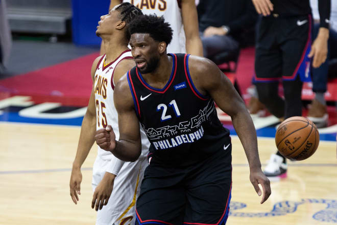 Philadelphia 76ers center Joel Embiid (21) reacts to his score against the Cleveland Cavaliers during overtime at Wells Fargo Center. Bill Streicher-USA TODAY Sports