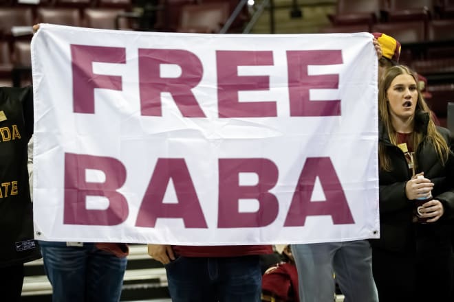 FSU fans held up a "Free Baba" sign during a November home game.