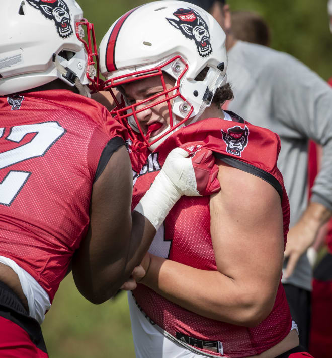 NC State freshman left guard Dylan McMahon (right) earned his first start last Saturday against Clemson.