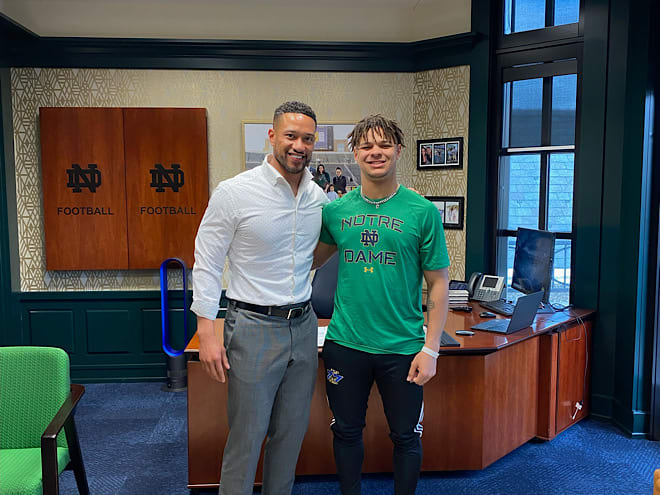 Four-star running back Jayden Limar, right, poses with Notre Dame head coach Marcus Freeman during a campus visit.