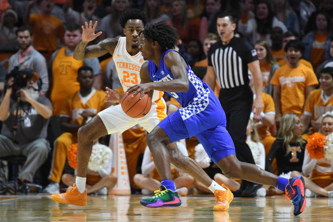 Kentucky's Tyrese Maxey drove around Tennessee's Jordan Bowden during the first half of Saturday's game in Knoxville.