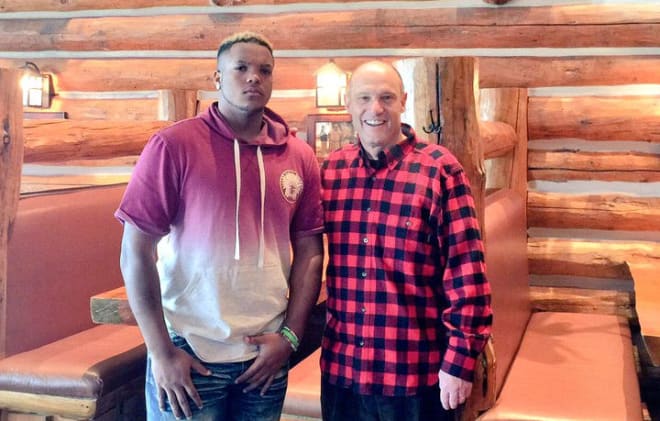 Nebraska defensive tackle commit Deontre Thomas with head coach Mike Riley during his official visit to Lincoln this past weekend.