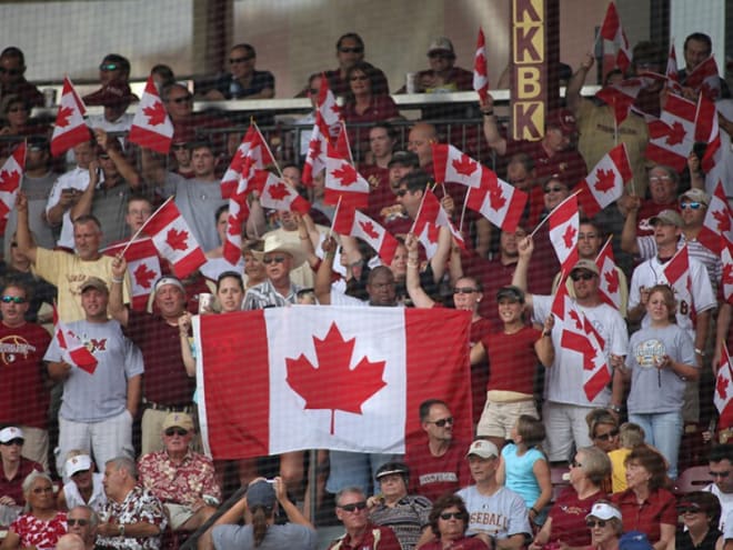 Canadian flags fly during the fifth inning of FSU home games.