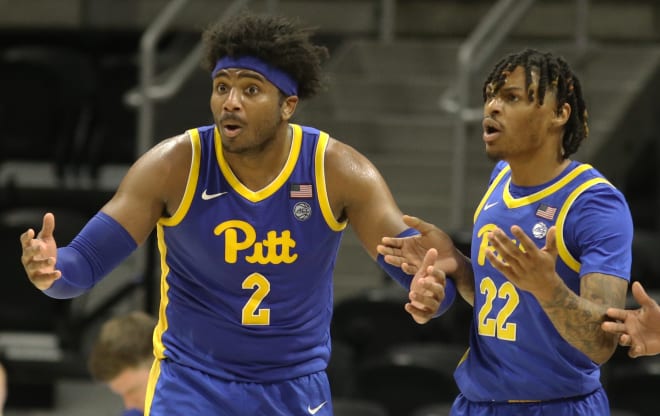 Pittsburgh junior power forward Blake Hinson, left, has blossomed after leaving Ole Miss for the Panthers this season.