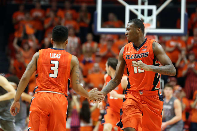  FEBRUARY 21: Illinois Fighting Illini forward Leron Black (12) high-fives Illinois Fighting Illini guard Te'Jon Lucas (3) during the Big Ten conference game against the Northwestern Wildcats 