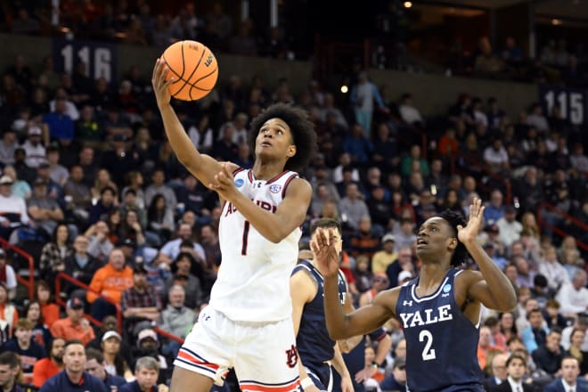 Auburn Tigers guard Aden Holloway (1) attempts a layup against Yale Bulldogs guard Bez Mbeng (2) during the second half of a game in the first round of the 2024 NCAA Tournament at Spokane Veterans Memorial Arena. | Photo: James Snook-USA TODAY Sports