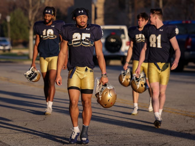 Notre Dame running back Chris Tyree, in front, has been slowed with a left ankle injury this spring.