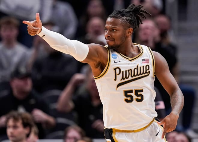 Purdue Boilermakers guard Lance Jones (55) points to teammates after a three-point basket Friday, March 29, 2024, during the midwest regional semifinals at the Little Caesars Arena in Detroit. © Grace Hollars/IndyStar / USA TODAY NETWORK