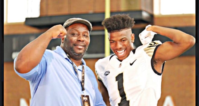 Banks poses with his dad during his Wake Forest visit
