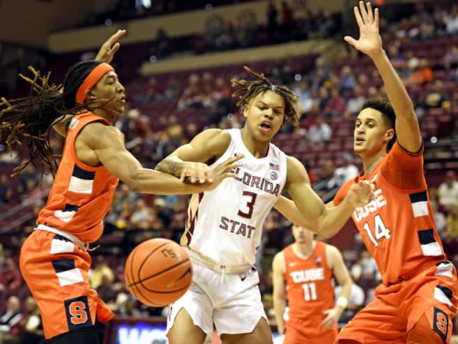 Feb 8, 2023; Tallahassee, Florida, USA; Syracuse Orange center Jesse Edwards (14) and forward Maliq Brown (1) pressure Florida State Seminoles guard Cameron Corhen (3) during the first half at Donald L. Tucker Center. Mandatory Credit: Melina Myers-USA TODAY Sports