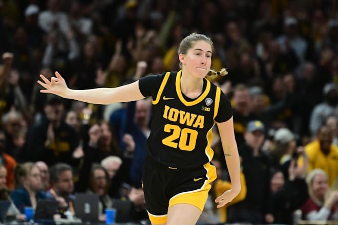 Apr 7, 2024; Cleveland, OH, USA; Iowa Hawkeyes guard Kate Martin (20) reacts after a basket against the South Carolina Gamecocks in the finals of the Final Four of the womens 2024 NCAA Tournament at Rocket Mortgage FieldHouse. 