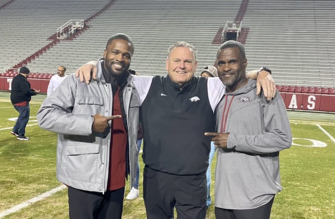 Arkansas head coach Sam Pittman (middle) poses with defensive coordinator Travis Williams (left) and co-defensive coordinator Marcus Woodson (right). 