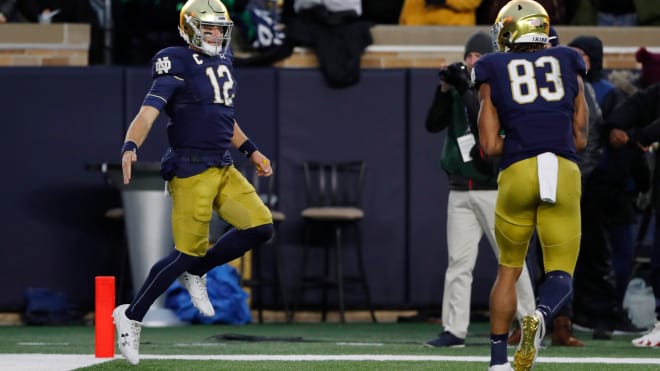 Quarterback Ian Book (12) and wideout Chase Claypool (83) provided much production from the 2016 class signed on offense.