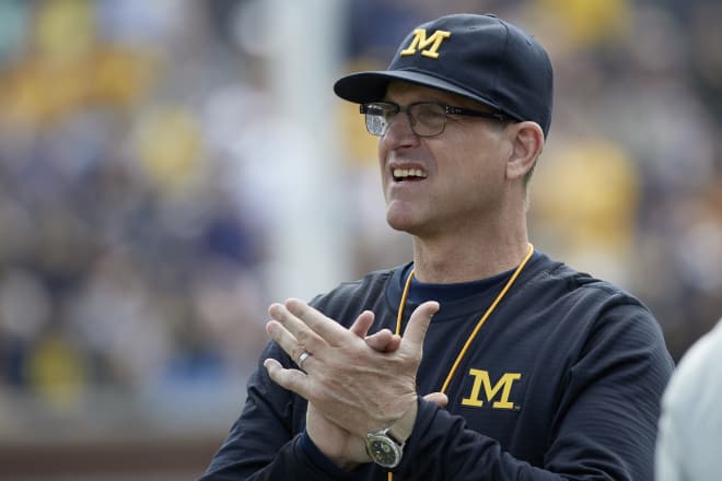 Head coach Jim Harbaugh looks to pair an improved offense with a redoubtable defense.