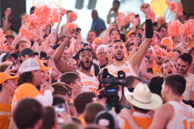 Tennessee basketball players celebrate with fans following the Vols 78-74 win over Arkansas at Thompson-Boling Arena on March 5, 2022.