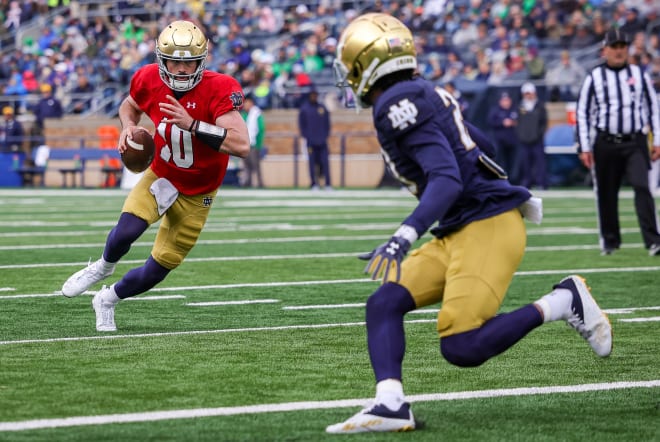 Notre Dame quarterback Sam Hartman runs for a touchdown during the Blue-Gold Game, April 22 at Notre Dame Stadium.